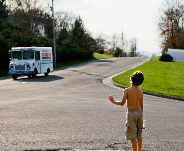 boy waiting for ice cream truck